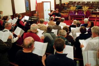 Brad Barbeau, musical director at St. Paul's Anglican church in Sydenahm rehearses with the community choir who will be performing two concerts on the Easter Weekend
